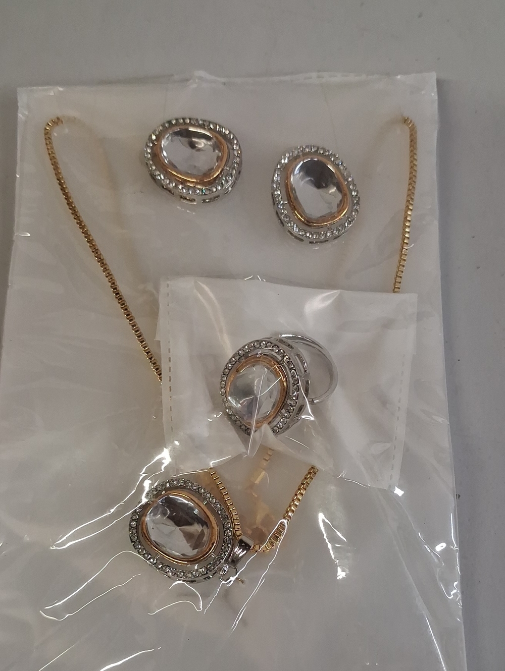 NWT Gold and Silver Crystal Pendant Necklace, Ring and Earring Set